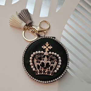 Elegant Black Crown Keychain with Gold Accents